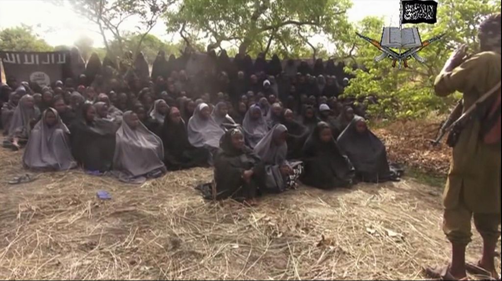 FILE - This Monday May. 12, 2014 file image taken from video by Nigeria's Boko Haram terrorist network, shows the alleged missing girls abducted from the northeastern town of Chibok. Dozens of girls and young women are being abducted by Islamic extremists in northeast Nigeria, raising doubts about an announced cease-fire and hopes for the release of 219 schoolgirls held captive since April. Thirty teenage girls and boys have been kidnapped since Wednesday Oct. 22, 2014, from villages around Mafa town, 40 kilometers (25 miles) from the Borno state capital, Maiduguri, the local government chairman Shettima Maina told reporters. (AP Photo/File)