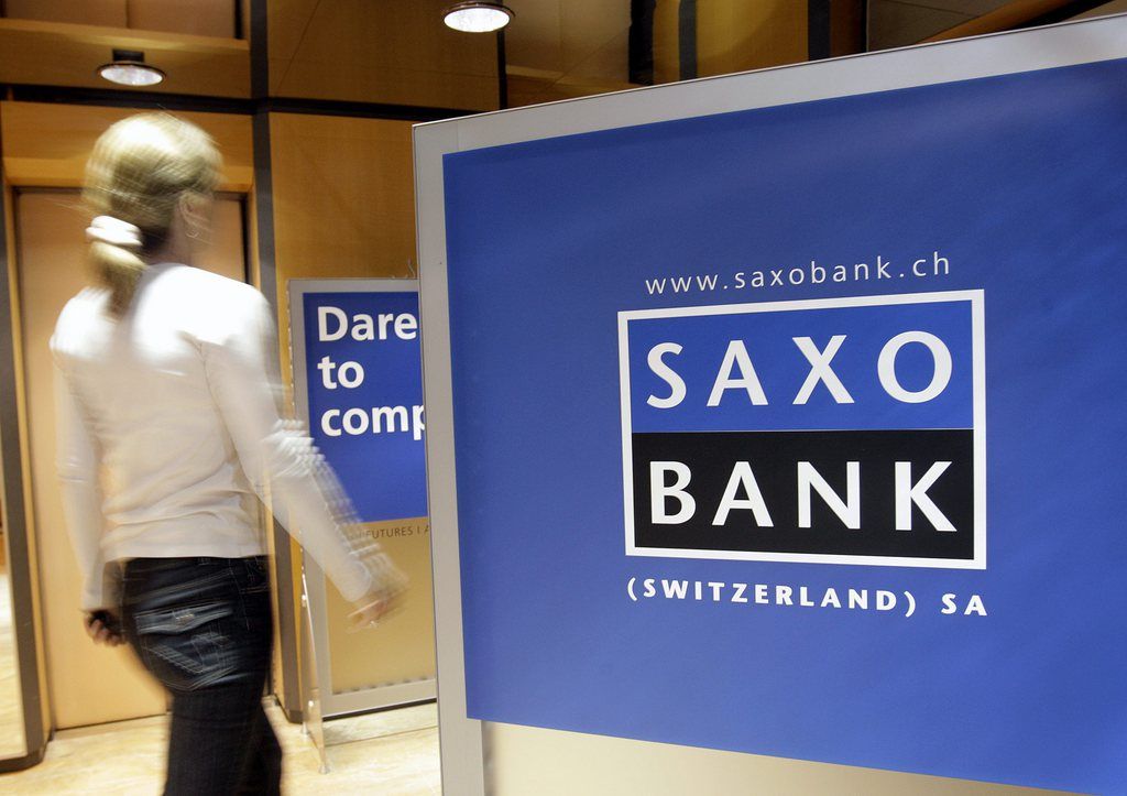 An employee walks in the hall of the Saxo Bank Headquarters of Switzerland, in Geneva, Switzerland, Monday, March 10, 2008. (KEYSTONE/Salvatore Di Nolfi)