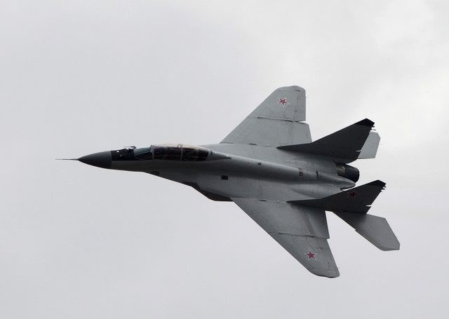 Russian MIG-29 plane performs a flight during a celebration marking the Russian air force's 100th anniversary in Zhukovsky, outside Moscow, Russia, Saturday, Aug. 11, 2012. (AP Photo/Misha Japaridze)