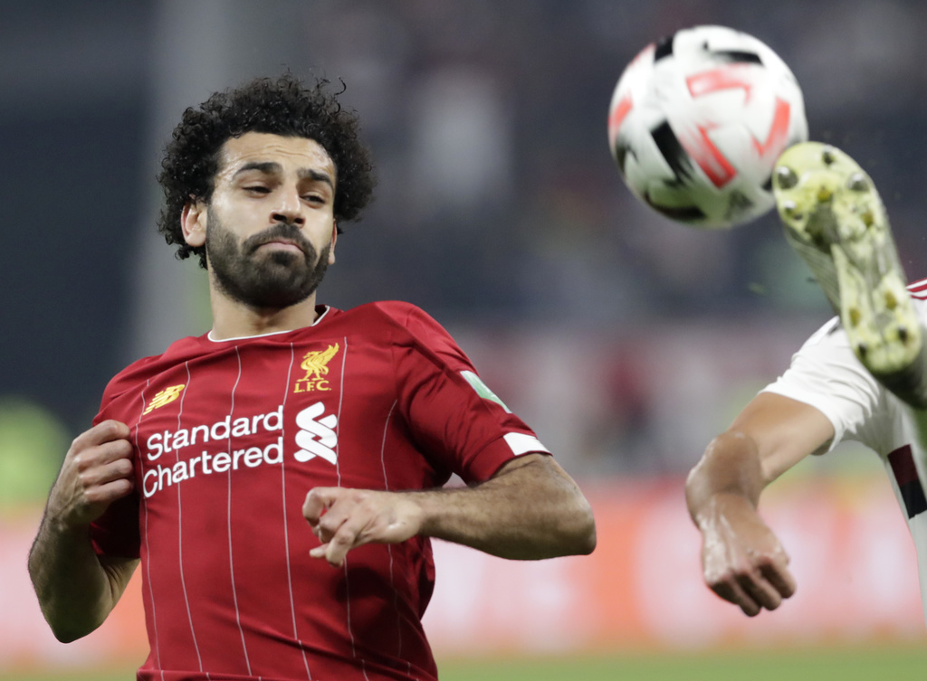 Liverpool's Mohamed Salah eyes the ball during the Club World Cup final soccer match between Liverpool and Flamengo at Khalifa International Stadium in Doha, Qatar, Saturday, Dec. 21, 2019. (AP Photo/Hassan Ammar)