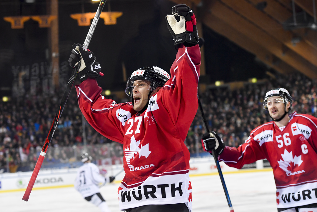 Team Canada`s Eric Faille celebrates after scoring 4-0 during the game between Team Canada and TPS Turku, at the 93th Spengler Cup ice hockey tournament in Davos, Switzerland, Monday, December 30, 2019. (KEYSTONE/Gian Ehrenzeller)