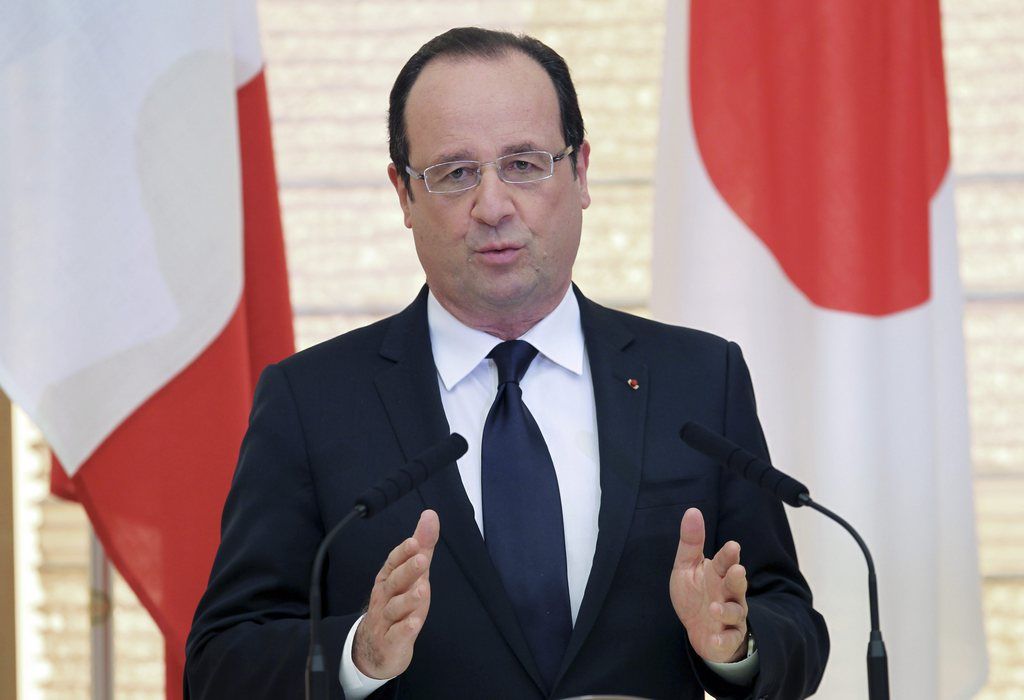French President Francois Hollande speaks during a joint press conference with Japanese Prime Minister Shinzo Abe, unseen, at prime minister's official residence in Tokyo Friday, June 7, 2013.  French President Hollande arrived in Japan on Thursday for a visit expected to focus on closer cooperation in nuclear energy technologies and on Prime Minister Shinzo Abe's economic strategies. (AP Photo/Junko Kimura, Pool)