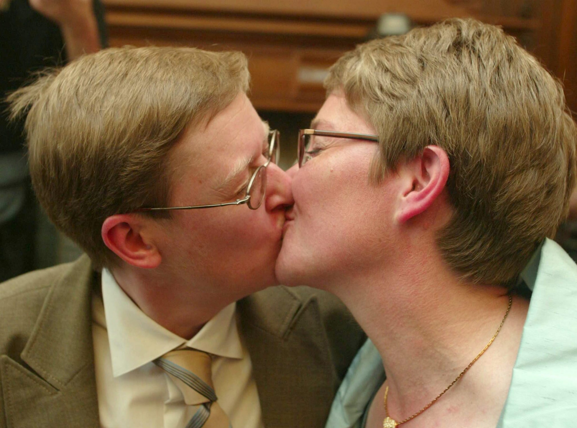 Marion Huibrechts (L) and Christel Verswyvelen (R) seal their wedding vows with a kiss during their marriage ceremony onFriday, 06 June 2003, in Kapellen. The homosexual couple is the first to get married in Belgium.   EPA-PHOTO/BELGA/PETER DE VOECHT