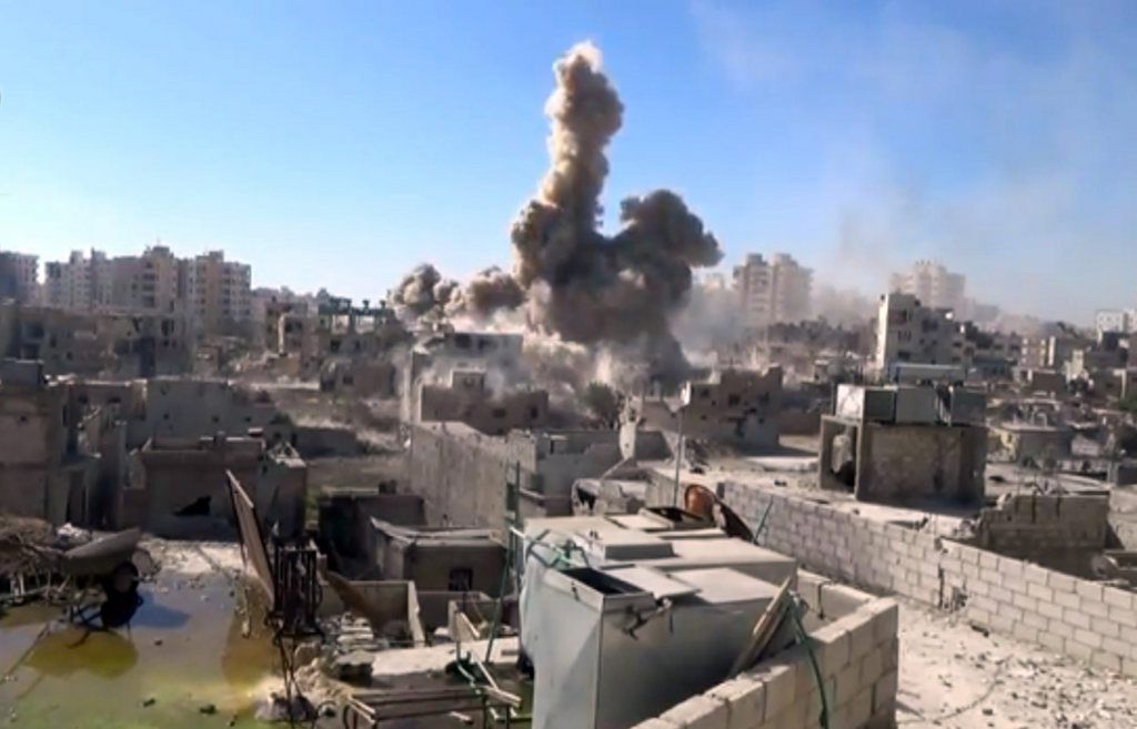 This image made from citizen journalist video posted by the Shaam News network, which is consistent with AP reporting, shows shelling in the Barzeh area of Damascus, Syria Tuesday, Sept. 17, 2013. Moscow insisted on Tuesday that a new Security Council resolution on Syria not allow the use of force, while the Arab country's main opposition group demanded a swift international response following the U.N. report that confirmed chemical weapons were used outside Damascus last month. (AP Photo/Shaam News Network via AP video)
