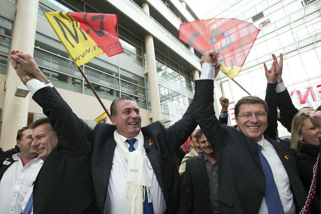 Le discours entre les candidats MCG à l'élection du  du Conseil d'Etat genevois Eric Stauffer, (centre) et Mauro Poggia (à droite), n'est plus à l'unisson. 