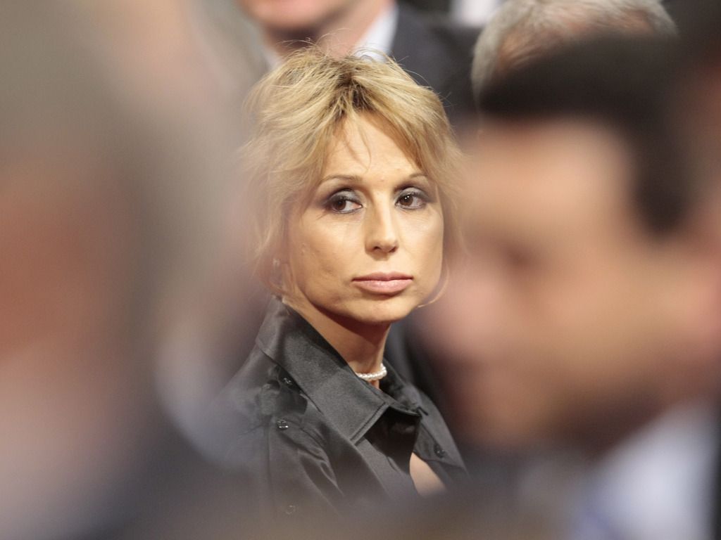 FILE - In this May 21, 2009 file photo Italian former Premier Silvio Berlusconi's daughter Marina Berlusconi looks on, during the Italian Confindustria industrialists and businessmen association assembly  in Rome's Auditorium. Italy may get its own political dynasty out of the ashes of Silvio Berlusconi?s political career. The nation has been buzzing with speculation that Marina Berlusconi will step in as her father?s political heiress ever since the Supreme Court last week confirmed the three-time former premier?s tax fraud conviction, jail sentence and ban from politics. Berlusconi?s eldest daughter is a long-time executive at his Mediaset media empire and was among a clutch of close advisers by his side at his Rome residence when the court ruled on Aug. 1, 2013. She has in the past repeatedly denied any intention to enter politics, but has remained silent during this new round of speculation. Political analysts say the prospect of a Marina Berlusconi candidacy is realistic. (AP Photo/Alessandra Tarantino, file)