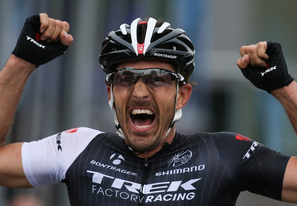 epa04156782 Swiss Fabian Cancellara of the Trek Factory Racing team celebrates winning the Tour of Flanders, Ronde van Vlaanderen, cycling race in Oudenaarde, Belgium, 06 April 2014.  EPA/JULIEN WARNAND