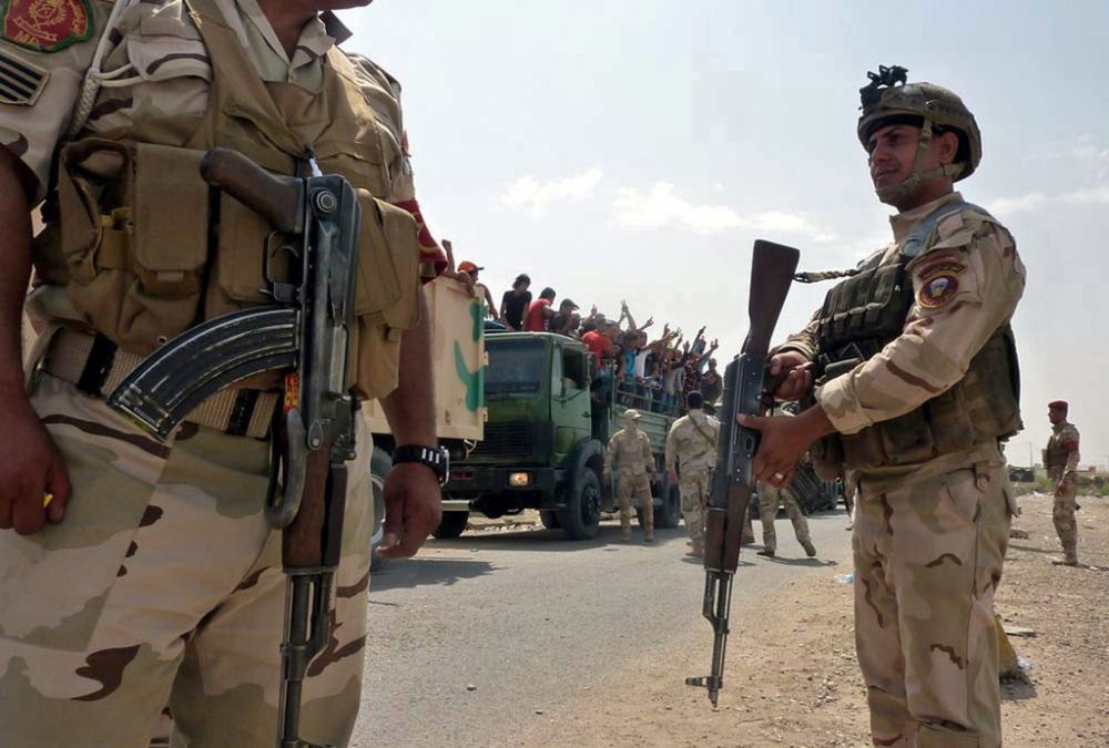 Les soldats irakiens se préparent à défendre Bagdad.