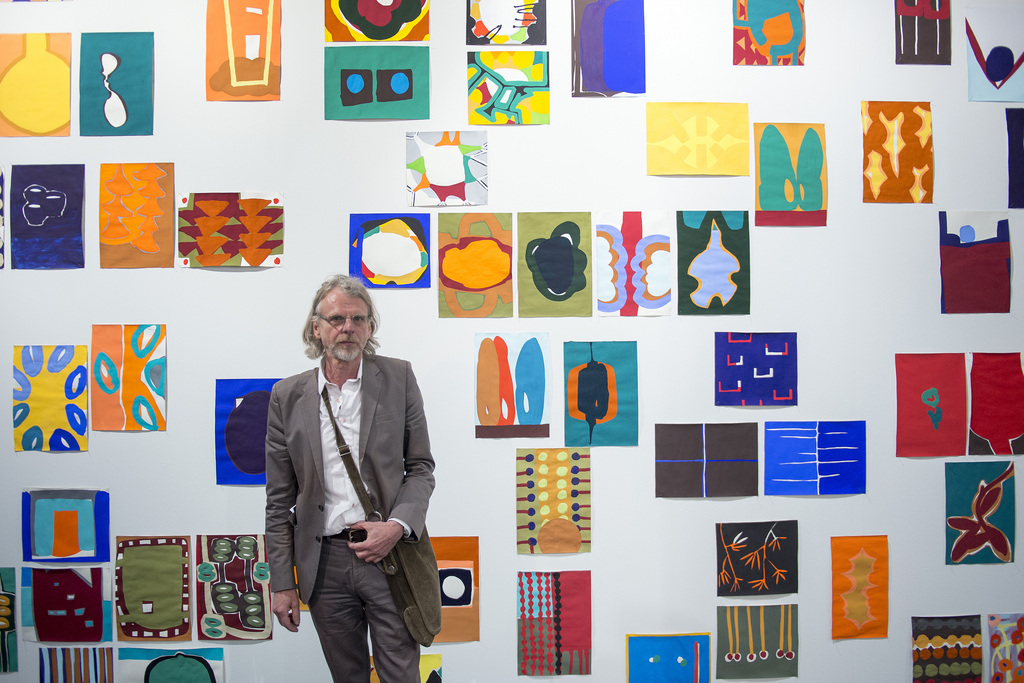 German-Swiss artist Markus Weggenmann, represented by the gallery Mark Mueller (Zuerich), poses in front of his artwork "Unplugged" (2014) at the international art show Art Basel, in Basel, Switzerland, on Tuesday, June 17, 2014. Over 300 leading galleries from North America, Latin America, Europe, Asia, and Africa show work from great masters of Modern and contemporary art to the latest generation of emerging stars. Every artistic medium is represented: paintings, sculpture, installations, videos, multiples, prints, photography, and performance. (KEYSTONE/Georgios Kefalas)