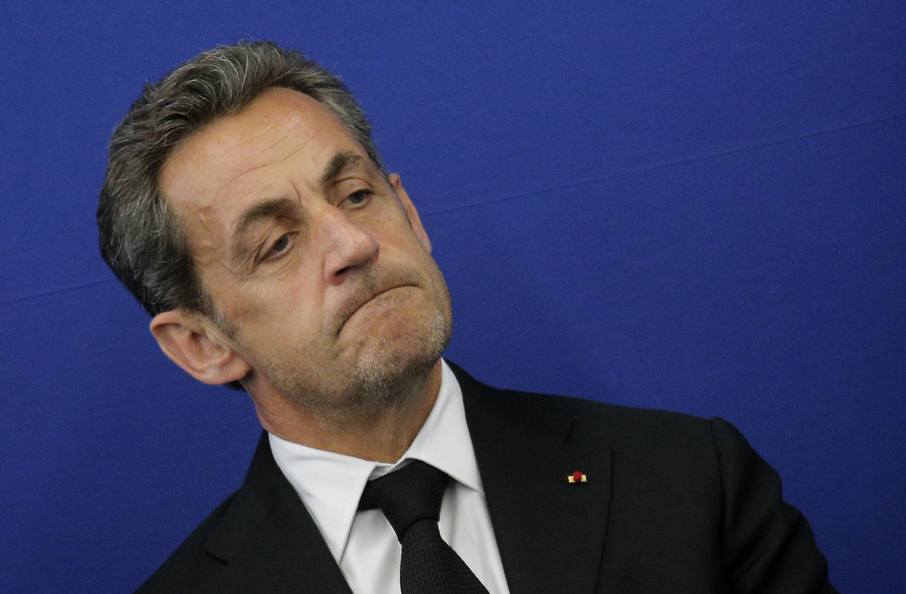 Former French President Nicolas Sarkozy is seen during the inauguration of the Foundation Claude Pompidou, Centre teaching and research on Alzheimer's disease, Monday, March 10, 2014. in Nice, southeastern France. The Foundation has focused on facilities designed for people suffering from Alzheimer's disease. Nicolas Sarkozy and his singer-songwriter wife Carla Bruni are asking a judge for an emergency injunction Monday March 10, 2014, barring any publication of private conversations secretly recorded by former aide Patrick Buisson, also including discussions between Sarkozy and his inner circle.(AP Photo/Lionel Cironneau)