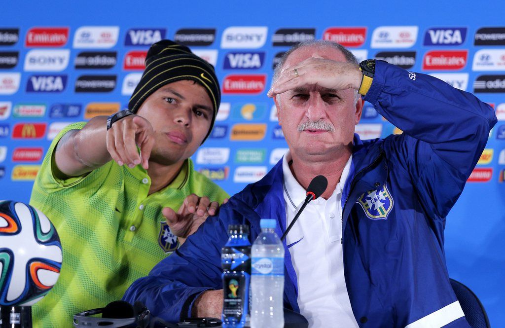 epa04311604 Brazil national soccer team head coach Luiz Felipe Scolari (R) and captain Thiago Silva (L) during a press conference at Estadio National in Brasilia, Brazil, 11 July 2014. Brazil will face The Netherlands on 12 July for the third place in the FIFA World Cup Brazil 2014 match at National Stadium in Brasilia.  EPA/ROBERT GHEMENT