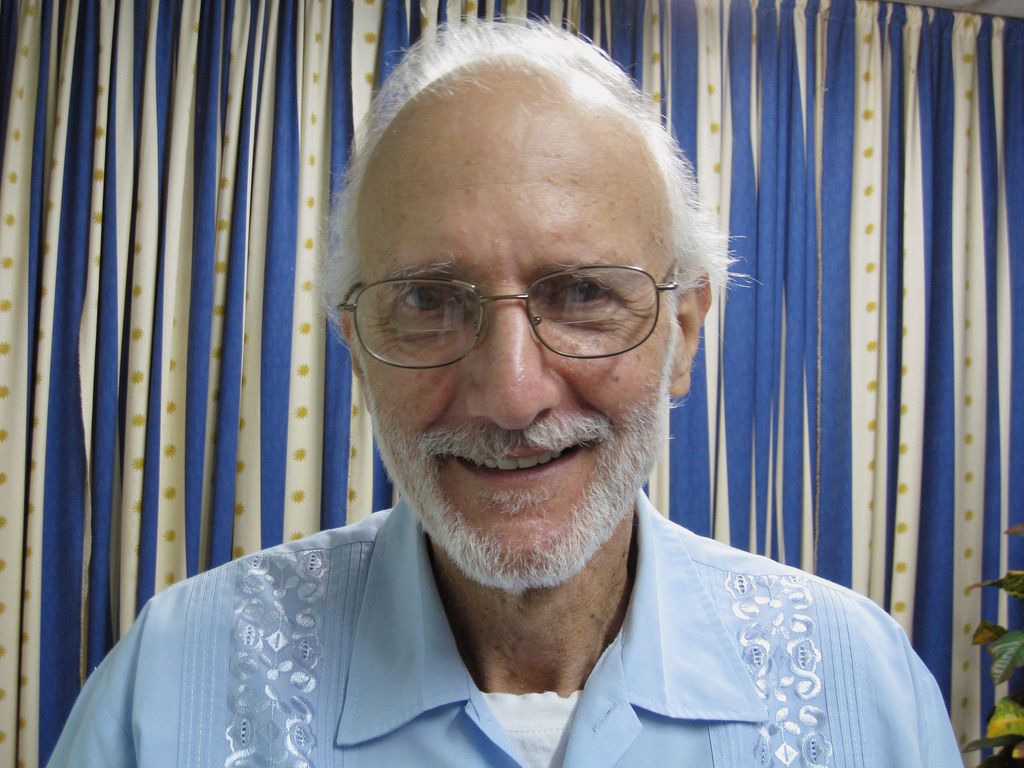 FILE - In this Nov. 27, 2012 file photo provided by U.S. lawyer James L. Berenthal, jailed American Alan Gross poses for a photo during a visit by Rabbi Elie Abadie and Berenthal at Finlay military hospital in Havana, Cuba. Gross, a U.S. government subcontractor imprisoned in Cuba, released a statement through his lawyer Tuesday, April 8, 2014, saying he began fasting to protest his treatment by the governments of Cuba and the United States. (AP Photo/James L. Berenthal, File)