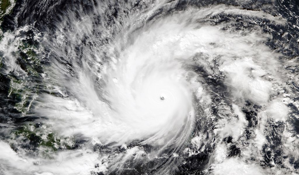 This image made available by the National Oceanic and Atmospheric Administration (NOAA) and captured by the Suomi NPP satellite's VIIRS instrument shows Typhoon Hagupit on Thursday, Dec. 4, 2014, as it approaches the Philippines. Villagers are fleeing coastal towns in the central Philippines as the advancing storm evokes memories of last year's deadly typhoon. Forecasters say Typhoon Hagupit may hit some of the same places devastated by Haiyan in 2013. (AP Photo/NOAA)