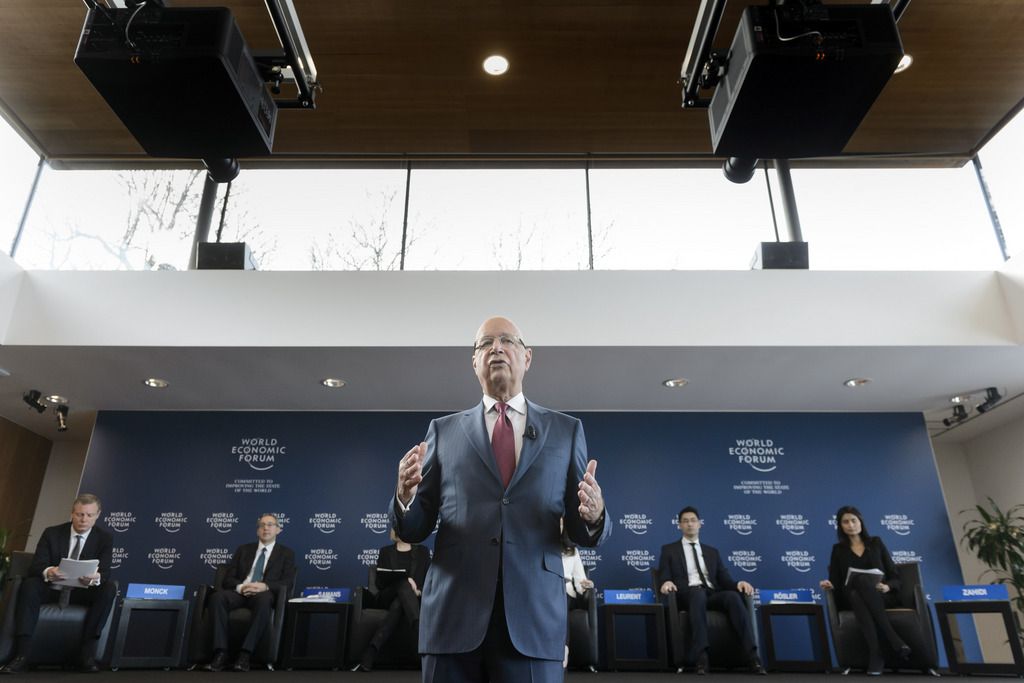German Klaus Schwab, founder and president of the World Economic Forum, WEF, gestures during a press conference, in Cologny near Geneva, Switzerland, Wednesday, January 14, 2015. The World Economic Forum today unveiled the programme for its Annual Meeting in Davos, Switzerland, including the key participants, themes and goals. The overarching theme of the Meeting, which will take place from from 21 to 24 January, is "The New Global Context". (KEYSTONE/Laurent Gillieron)