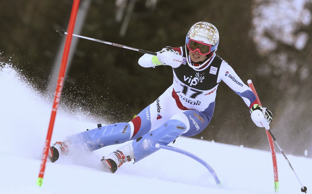 Michelle Gisin of Switzerland competes on her way to clock the 10th fastest time during the first run of an alpine ski, women's World Cup slalom in Sljeme Zagreb, Croatia, Sunday, Jan. 4, 2015. (AP Photo/Giovanni Auletta)