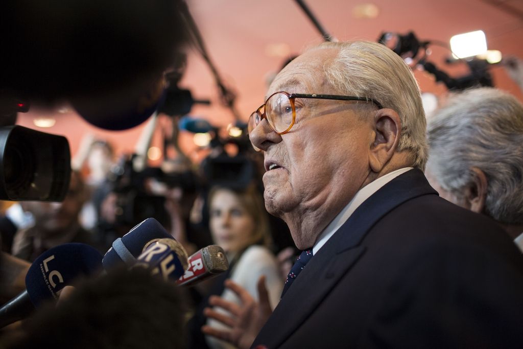 French far-right Front National former leader Jean Marie Le Pen speaks with journalists during the 15th congress of the party, in Lyon, central France, Saturday, Nov. 29, 2014. His daughter Marine Le Pen is eyeing French presidential elections in 2017 and has worked to scrub the stigma from the far-right anti-immigration party,  which is now a rising political force in France. But tensions have risen between Marine Le Pen and her father, Jean-Marie Le Pen, who led the National Front for nearly four decades and has been convicted of racism and anti-Semitism, as the new leadership seeks an image change. (AP Photo/Laurent Cipriani)