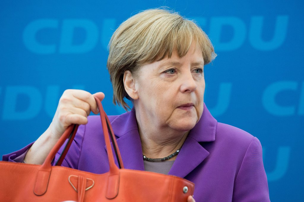 epa04713069 German Chancellor Angela Merkel Christian Democratic Union (CDU) attends a session of the CDU federal board meeting, in Berlin, Germany, 20 April 2015.  EPA/MAURIZIO GAMBARINI