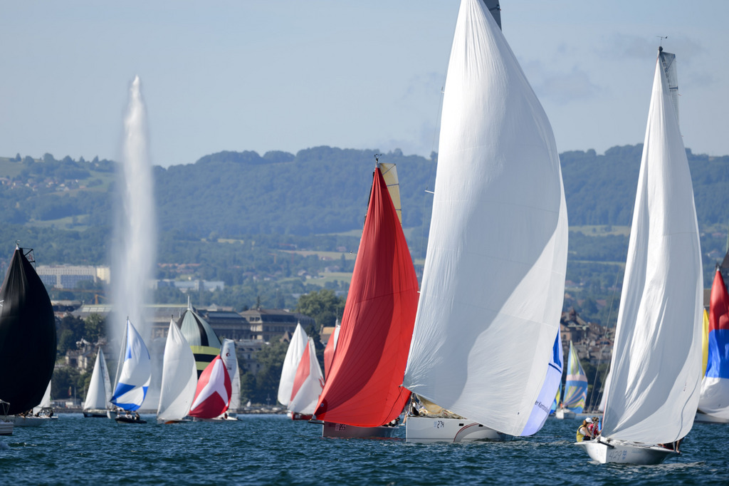 Sailing boats sail in front of the water fountain (Jet d'eau) at the 77 th "Bol d' Or", a sailboat race on the Geneva Lake, in Geneva, Switzerland, Saturday, June 13, 2015. About 500 boats participate in this weekend's Bol d'Or. The Societe Nautique de Geneve, SNG, organizes one of the worlds biggest regattas and the largest sailing event held on a lake in Europe. (KEYSTONE/Laurent Gillieron)
