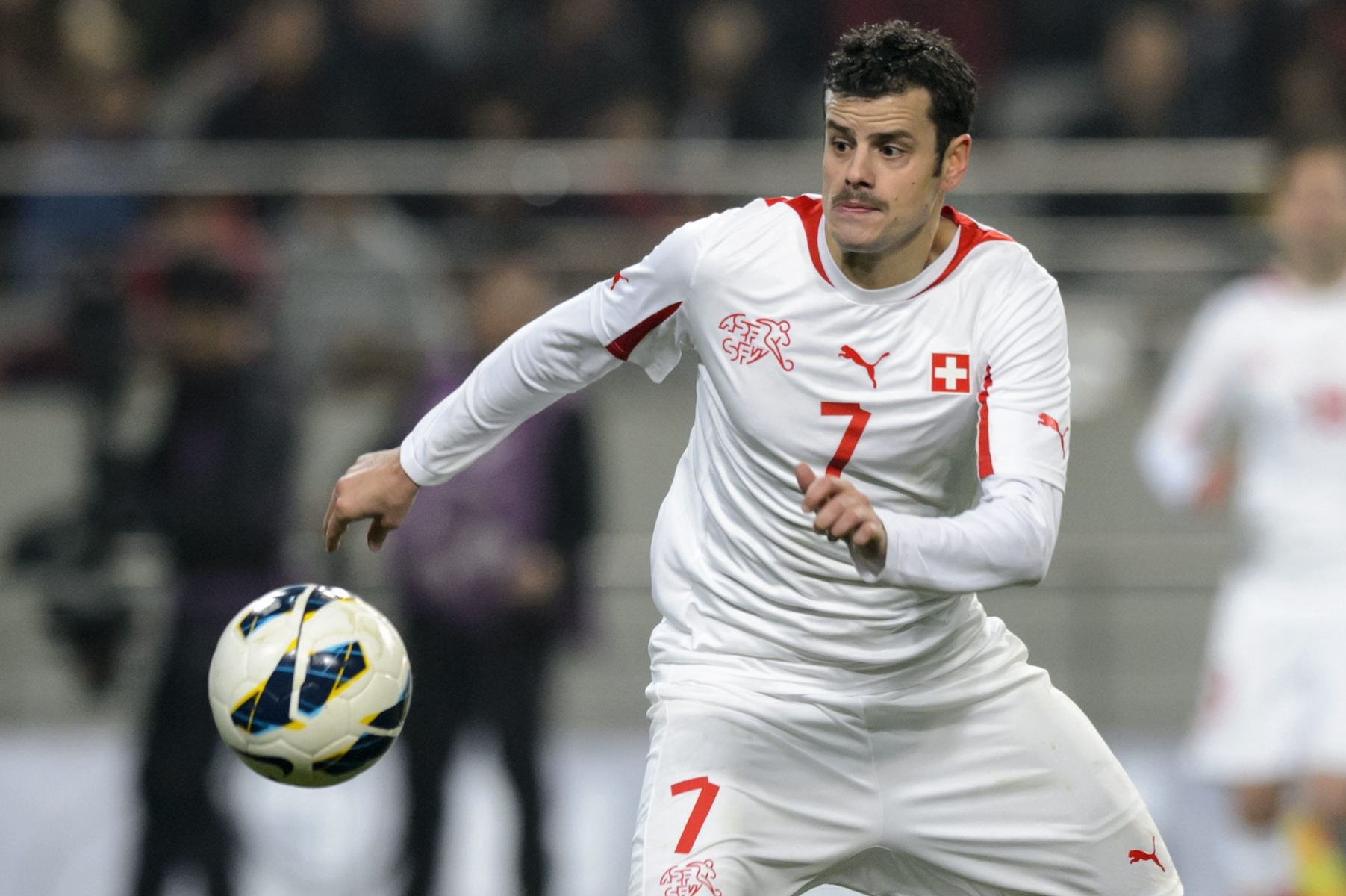 Swiss midfielder Tranquillo Barnetta runs with the ball during an international friendly soccer match between South Korea and Switzerland at the Sangam World Cup stadium in Seoul, South Korea, Friday, November 15, 2013. Switzerland and South Korea are already qualified for the upcoming 2014 Fifa World Cup in Brazil. (KEYSTONE/Laurent Gillieron)