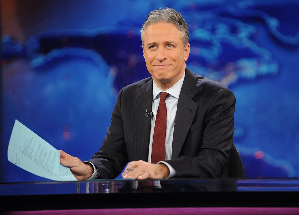 FILE - This Nov. 30, 2011 file photo shows television host Jon Stewart during a taping of "The Daily Show with Jon Stewart" in New York. Stewart says goodbye on Thursday, Aug. 6, 2015, after 16 years on Comedy Central's "The Daily Show" that established him as America's foremost satirist of politicians and the media. (AP Photo/Brad Barket, File)