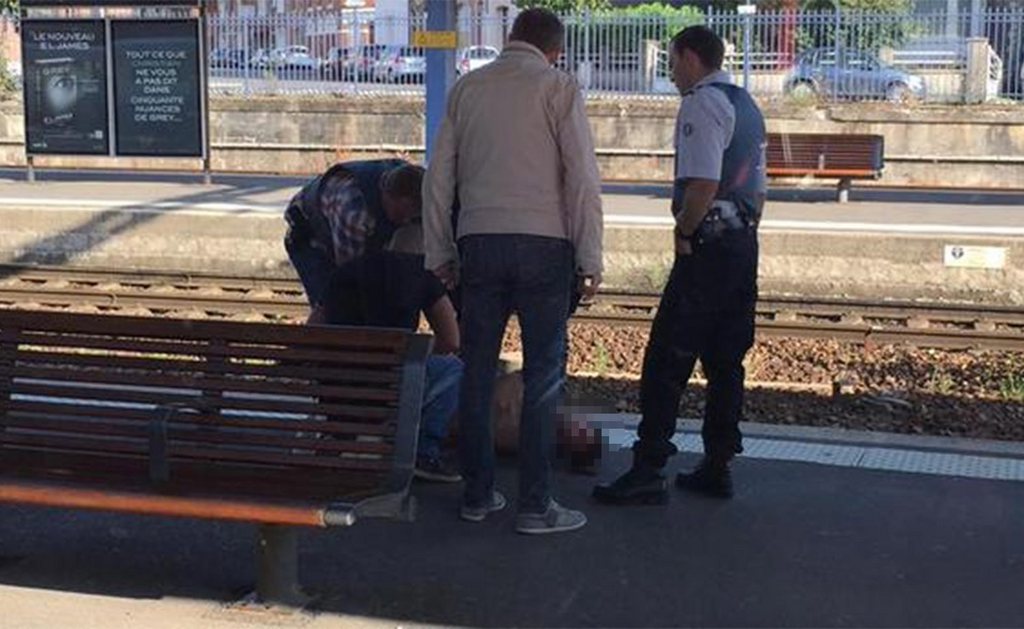epa04891893 A photo released with permission via Twitter user @FreedomFilmLLC of security forces detaining the suspect of the shooting on a Thays train at Arras train station in Arras, northern France, 21 August 2015. A man opened fire on a high-speed Thalys train travelling to Paris from Amsterdam leaving at least two people injured, French officials said. The man was arrested at a station in the northern French town of Arras, according to a statement by the Elysee Palace, but his identity and motive were unclear.  EPA/CHRISTINA CATHLEEN COONS BEST QUALITY AVAILABLE, MANDATORY CREDIT: CHRISTINA CATHLEEN COONS . French law requires that for publication within France faces of apprehended individuals must be made unreconisable. HANDOUT EDITORIAL USE ONLY/NO SALES/NO ARCHIVES