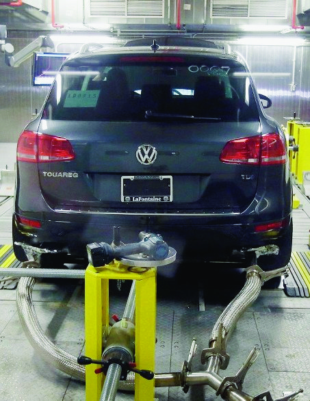 A Volkswagen Touareg diesel is tested in the Environmental Protection Agency's cold temperature test facility, Tuesday, Oct. 13, 2015, in Ann Arbor, Mich. Volkswagen has disclosed to U.S. regulators that theres additional suspect software in its 2016 diesel models that would potentially help their exhaust systems run cleaner during government tests. (AP Photo/Carlos Osorio) Volkswagen New Defeat Device