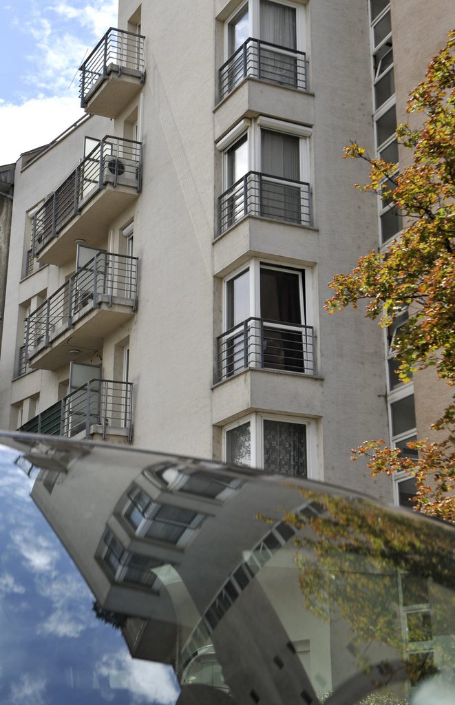 The outside view of the apartment building which is supposed to be  the last known location of Hungarian Nazi WWII crime suspect Laszlo Csatary in Budapest, Hungary, Monday, July 16, 2012. The Nazi-hunting Simon Wiesenthal Centre's Efraim Zuroff last week submitted new evidence to the prosecutor in Budapest regarding crimes committed during World War II by its No 1 Most Wanted suspect Laszlo Csatary, who is accused of complicity in the deaths of 15,700 Jews. (AP Photo/Bela Szandelszky)