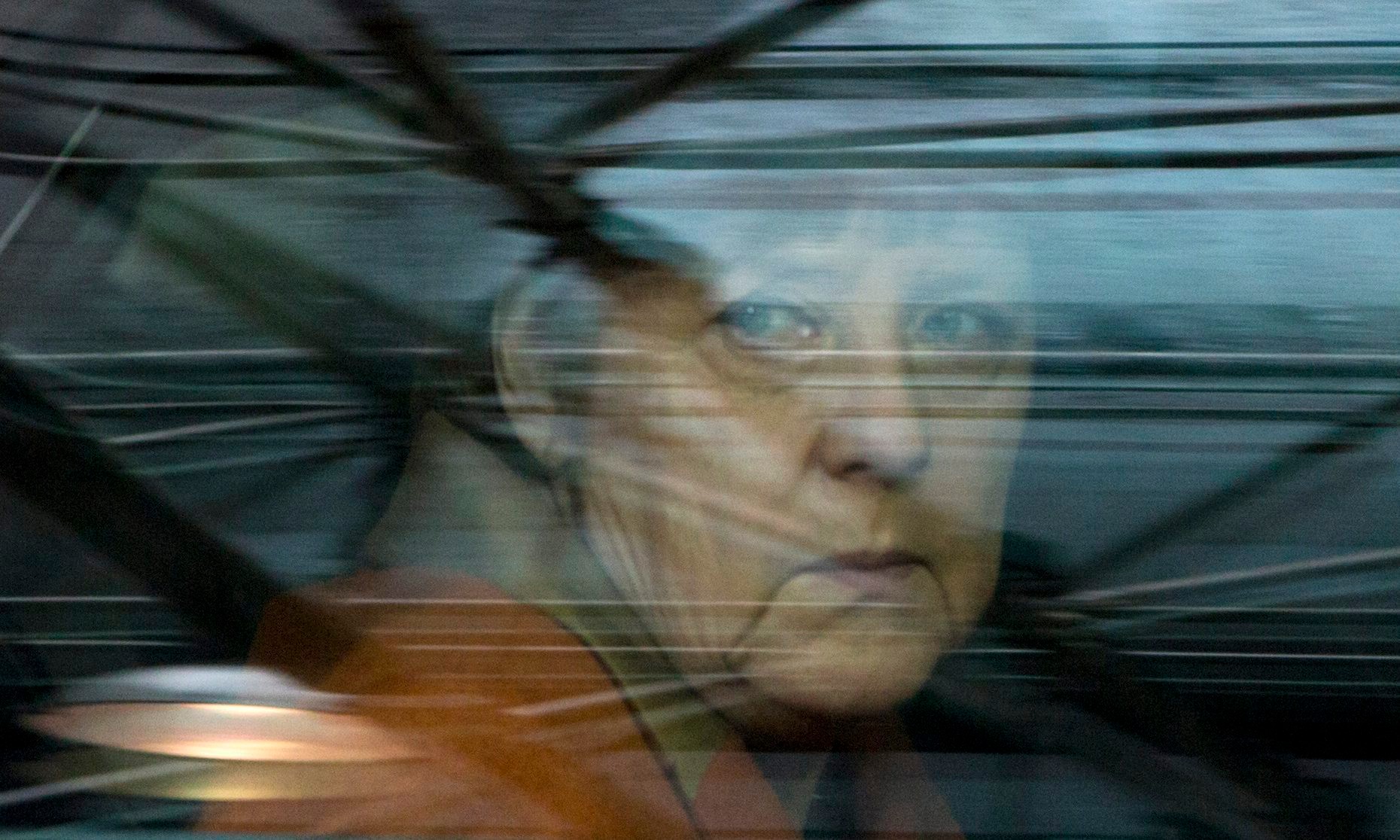 German Chancellor Angela Merkel looks out of her car window as she arrives for an EU summit at the EU Council building in Brussels on Monday, March 7, 2016. European Union leaders are holding a summit in Brussels on Monday with Turkey to discuss the current migration crisis. (AP Photo/Virginia Mayo) Belgium EU Summit