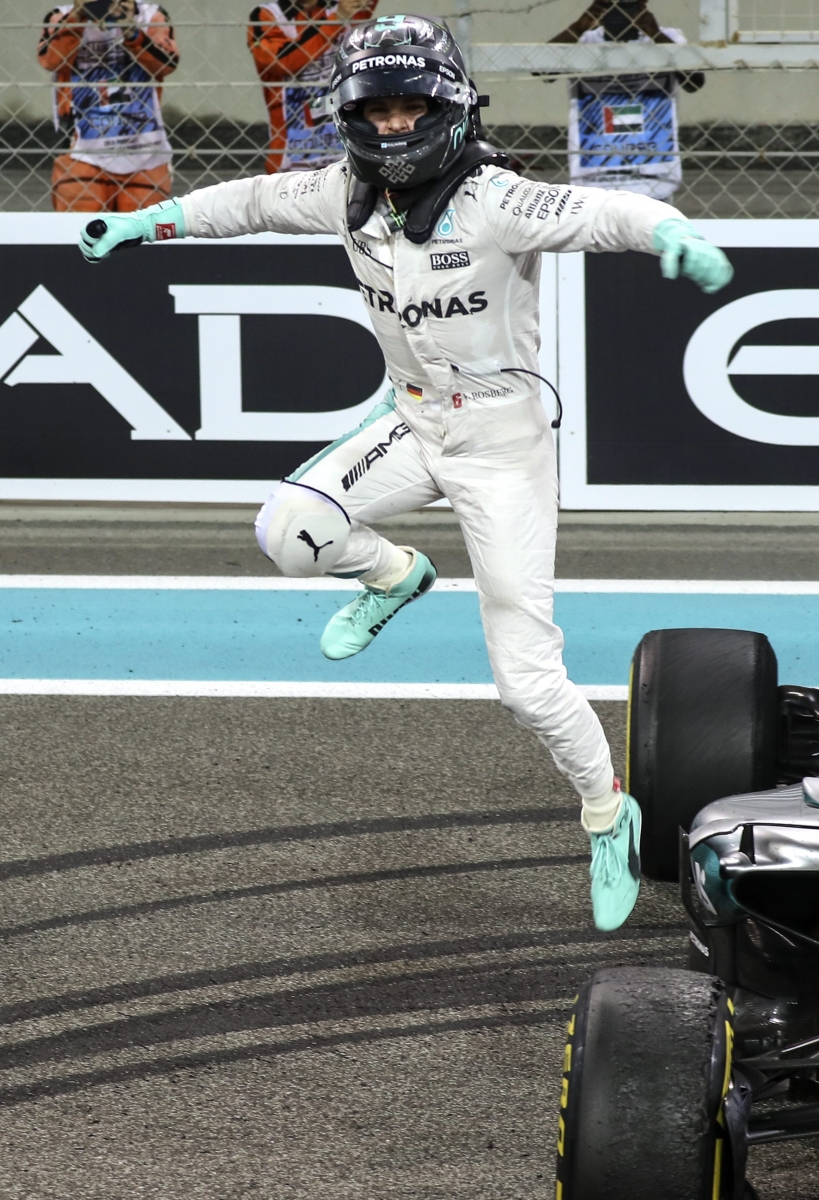 epa05649595 German Formula One driver Nico Rosberg of Mercedes AMG GP   celebrates winning the Formula One World Championship 2016 after his second place in the Abu Dhabi Formula One Grand Prix at Yas Marina Circuit in Abu Dhabi, United Arab Emirates, 27 November 2016.  EPA/SRDJAN SUKI