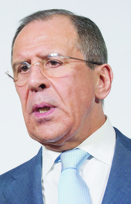 Russian Foreign Minister Sergei Lavrov speaks during a press conference in Neuchatel, Switzerland, Friday, April 12, 2013. Lavrov is on a working visit in Switzerland. (KEYSTONE/Sandro Campardo) SWITZERLAND SERGUEI LAVROV DIDIER BURKHALTER