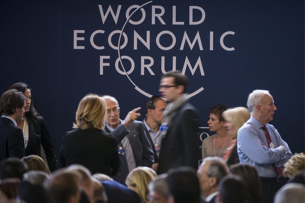 Participants gather to attend the welcoming address of German Klaus Schwab, Founder and Executive Chairman of the World Economic Forum, WEF, on the eve of the opening of the 43rd Annual Meeting of the World Economic Forum, WEF, in Davos, Switzerland, Tuesday, January 22, 2013. The theme of the meeting, which will take place from 23 to 27 January, is "Resilient Dynamism". (KEYSTONE/Laurent Gillieron)