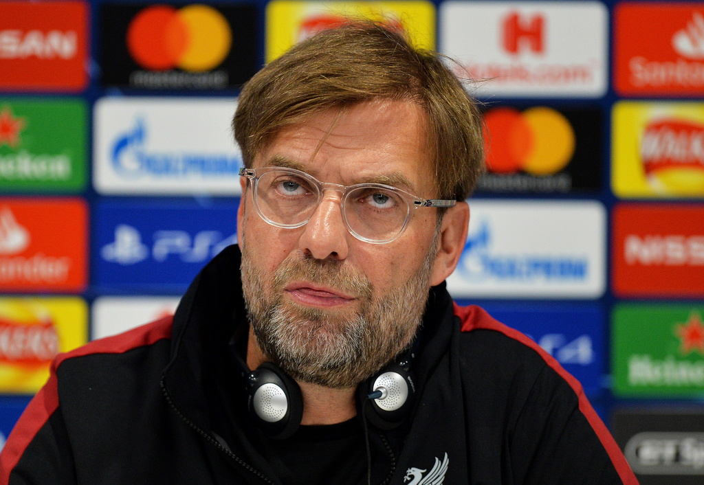 L'entraîneur de Liverpool Jürgen Klopp a attaqué vendredi l'UEFA en raison des coûts des voyages et des prix des places pour les finales de Coupes d'Europe. (Archives)