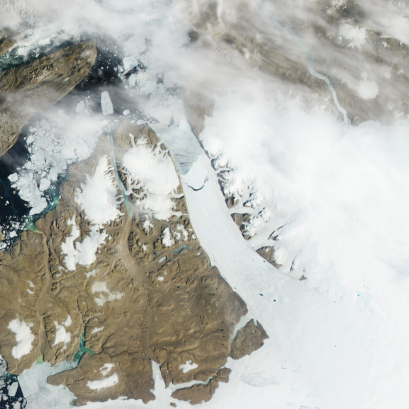 This Monday, July 16, 2012 satellite image provided by NASA shows calving, crescent-shaped crack at center, on the Petermann Glacier in northwestern Greenland. An iceberg twice the size of Manhattan tore off one of Greenland's largest glaciers. Scientists had been watching the 15-mile long crack in the floating ice shelf of the northerly Petermann Glacier for several years. On Monday NASA satellites showed it had broken completely, forming a 46 square mile iceberg. Petermann spawned an iceberg twice that size in 2010. (AP Photo/NASA)