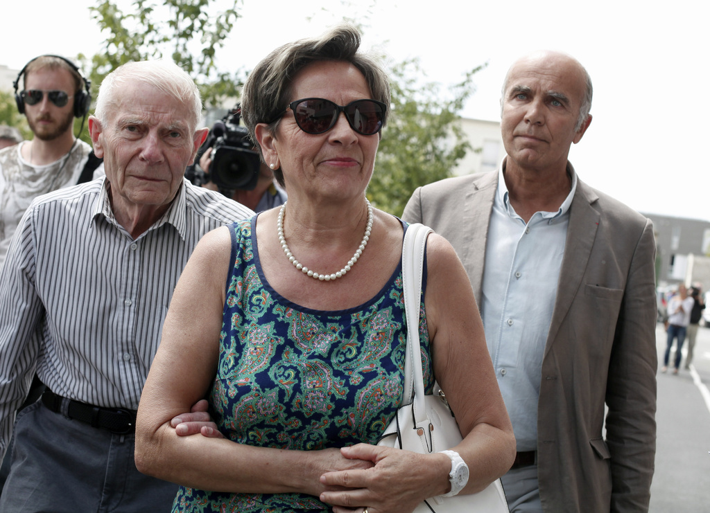 FILE - In this July 23, 2015 file photo, Viviane and Pierre Lambert, parents of Vincent Lambert, arrive at the Sebastopol hospital, in Reims, eastern France, where Vincent, who is currently on artificial life support, is hospitalized. France's highest administrative court has ruled that doctors can stop feeding and hydrating Vincent Lambert who is hospitalized in a vegetative state despite his parents' objections. (AP Photo/Thibault Camus, File)